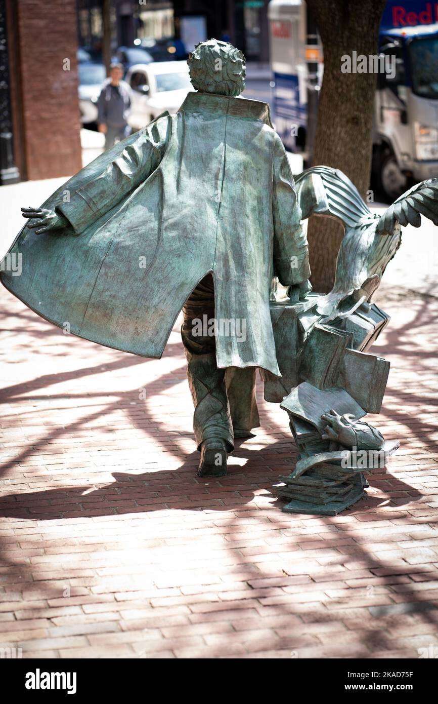 A vertical back view of the Edgar Allan Poe statue in Boston