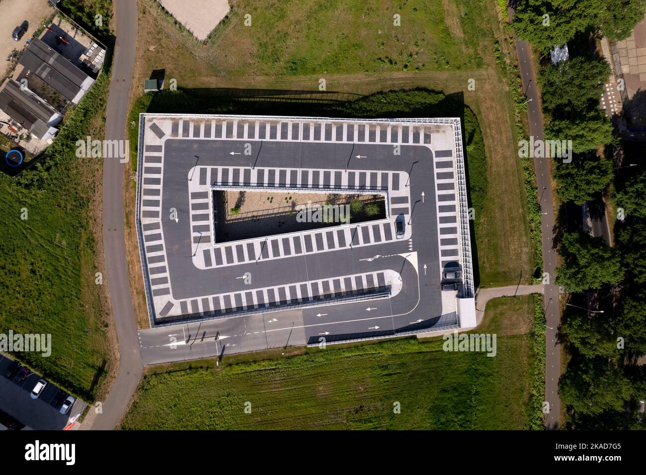 Meadow outline top down aerial view with a single car parked in graphic