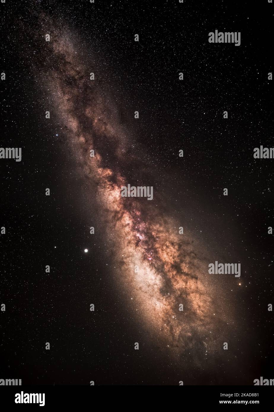A vertical shot of the milky way in the night sky Stock Photo - Alamy