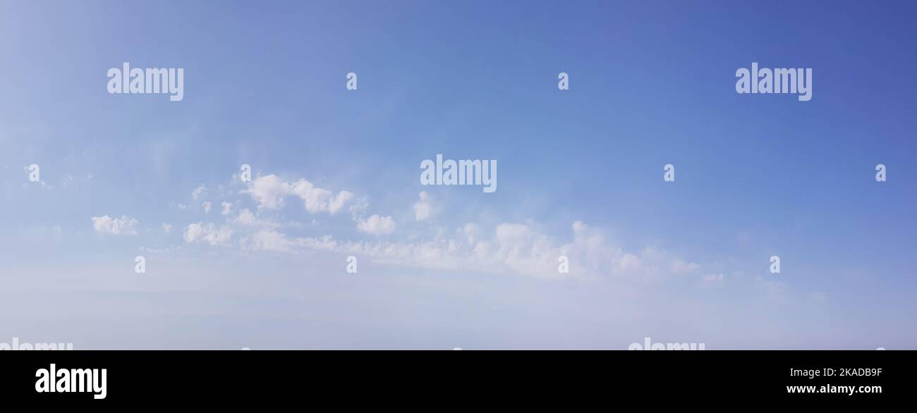 Blue sky and clouds background with lots of copy space Stock Photo - Alamy