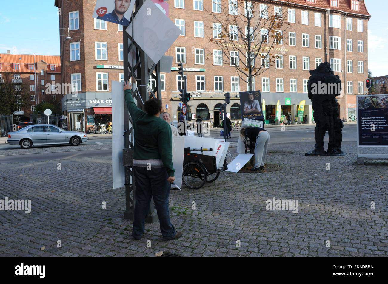 Copenhagen/Denmark/02 November 2022/ Now danish general electuons is over and young  female remove elections campaign playcards in capital.  (Photo. Francis Joseph Dean/Dean Pictures. Stock Photo