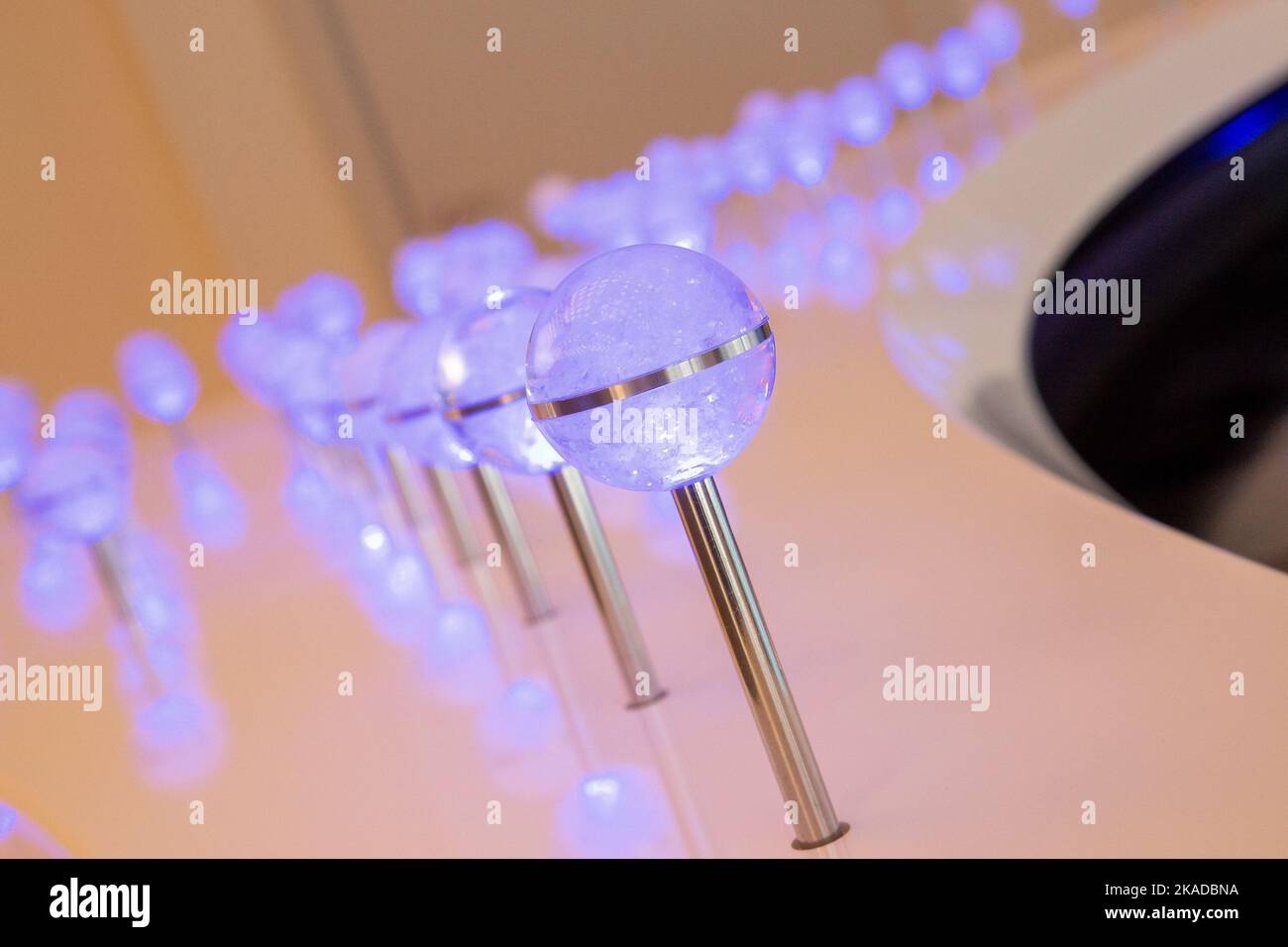 light balls with silver stands charge Stock Photo Alamy
