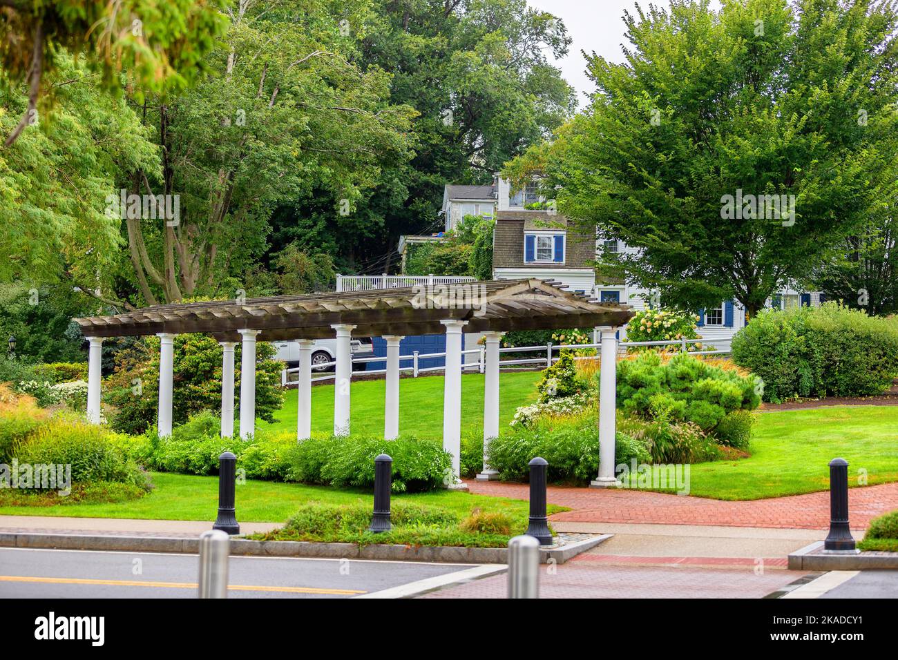 Entrance arbor into Brewster Gardens a public park across from the waterfront in Plymouth Massachusetts. Stock Photo