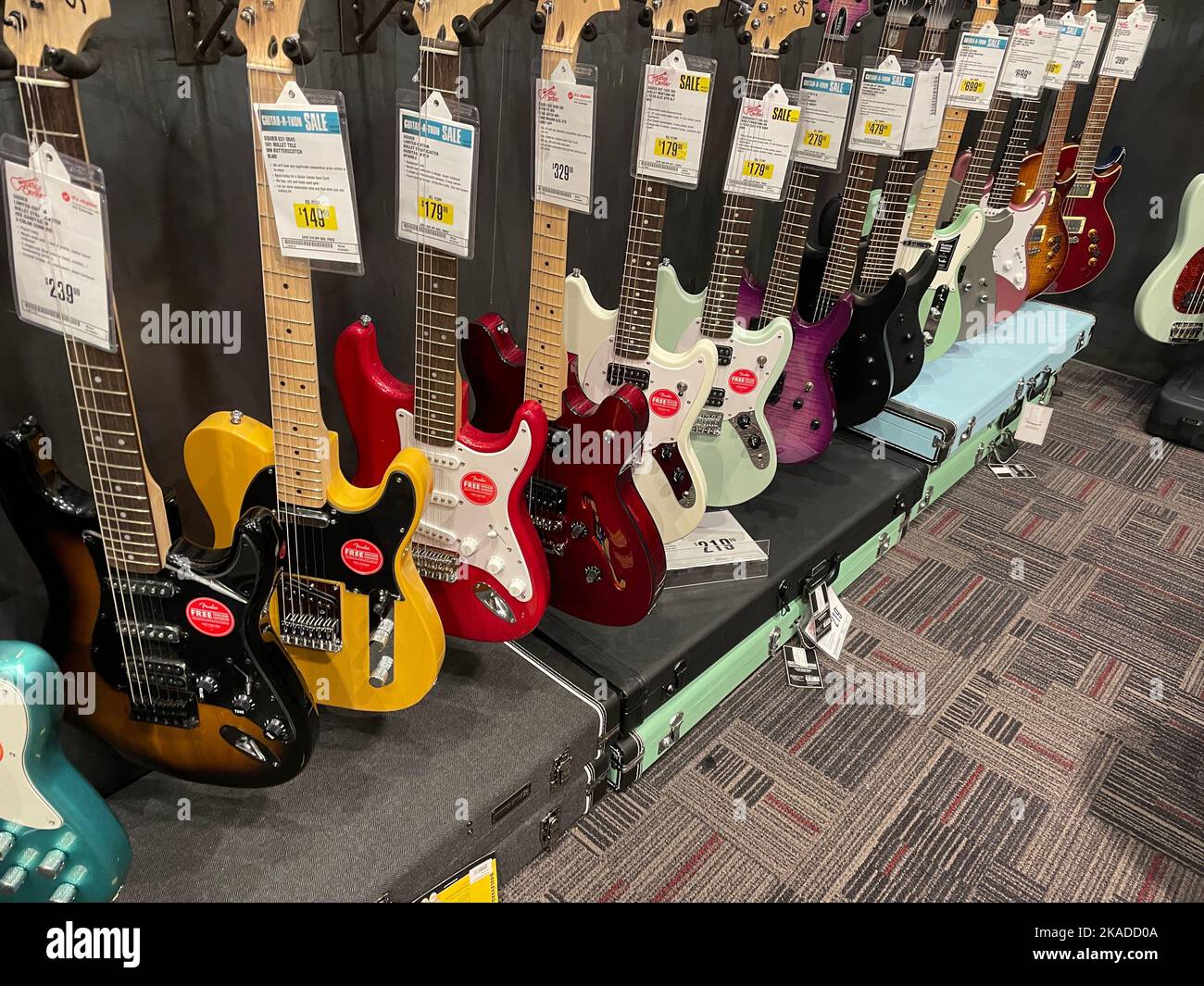 Augusta, Ga USA 04 18 22 Guitar Center retail store row of various