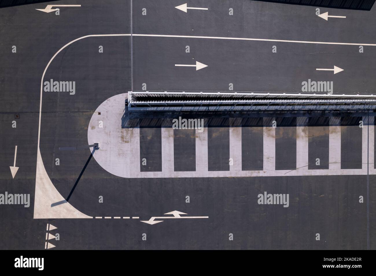Graphic top down aerial view outline of car parking lot with arrows and