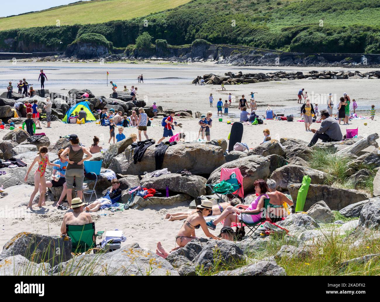 Families enjoying holiday on the beach Stock Photo