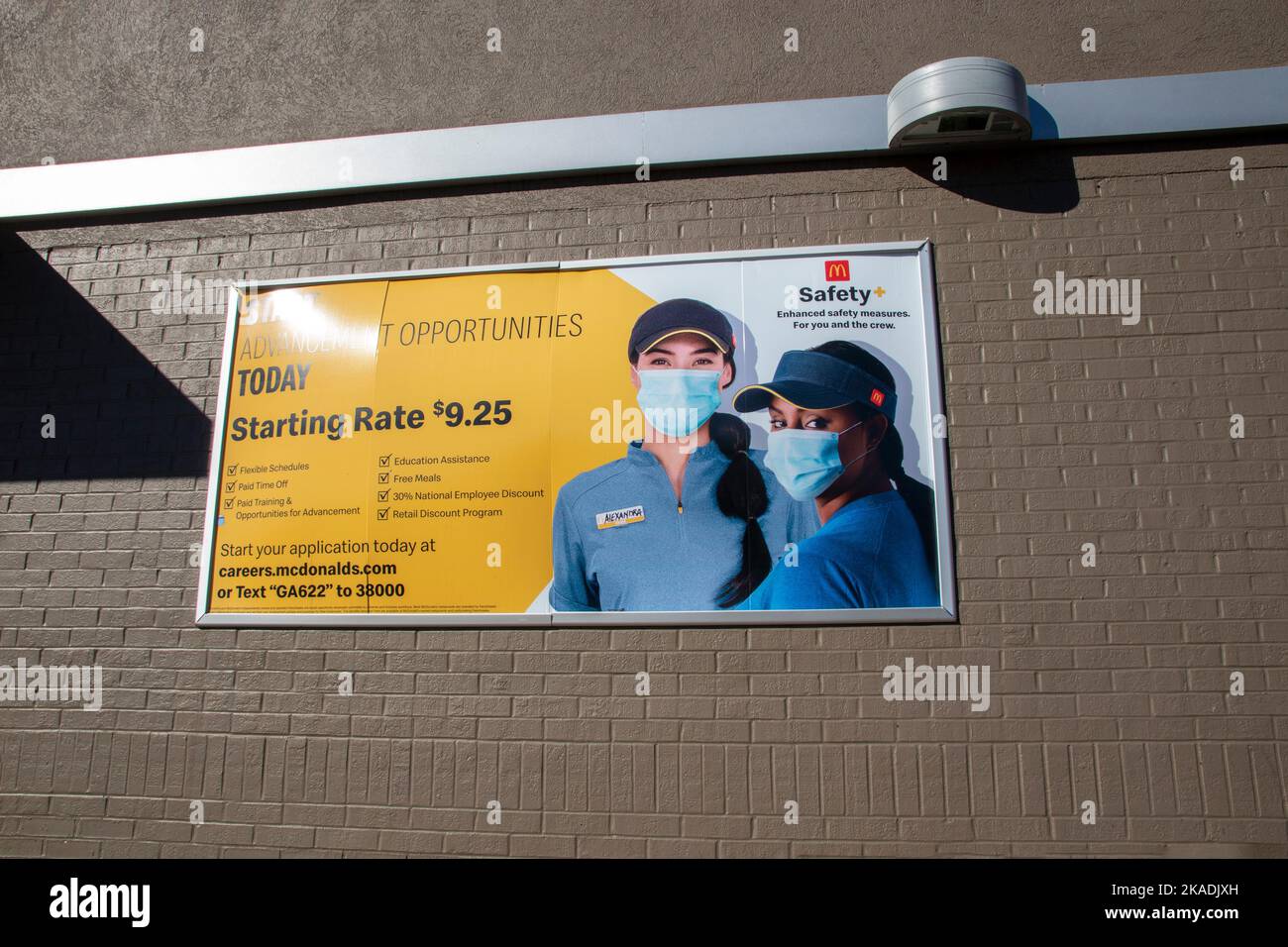 Augusta, GA USA 11 14 21 McDonalds Now Hiring banner people wearing