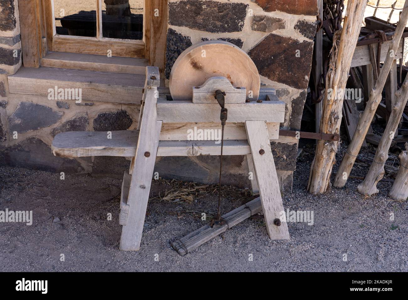 A vintage wooden foottreadle sharpening stone at the pioneer Cove