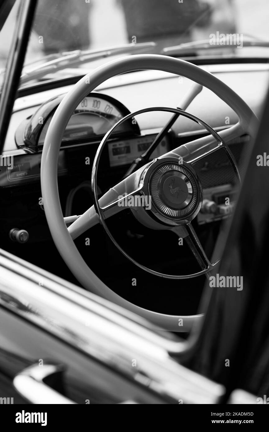 An oldtimer black car steering wheel Stock Photo Alamy