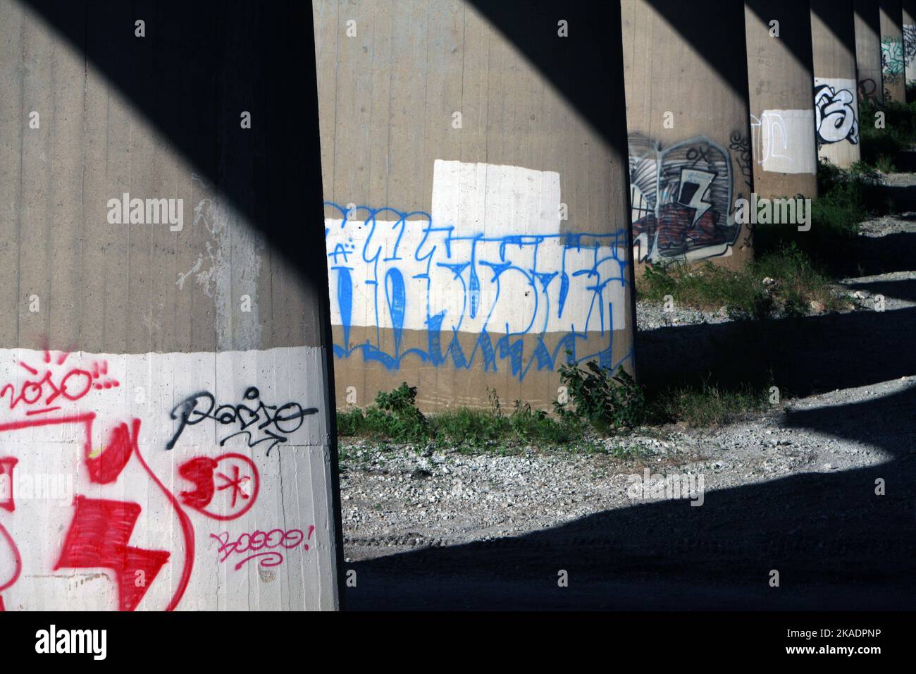 A graffiti art under an overpass bridge Stock Photo Alamy