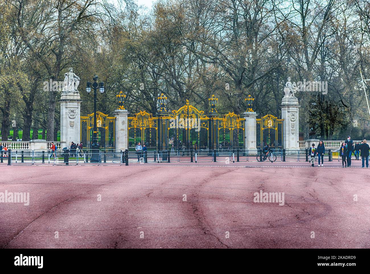 LONDON - APRIL 11, 2022: Gate with gilded ornaments in Buckingham Palace, one of the main tourist attractions in London, England, UK Stock Photo