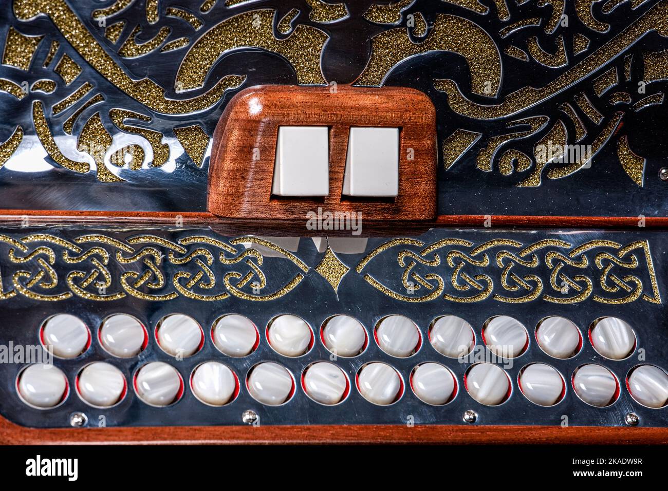 Irish 3 row button accordion with filigree metal work Stock Photo