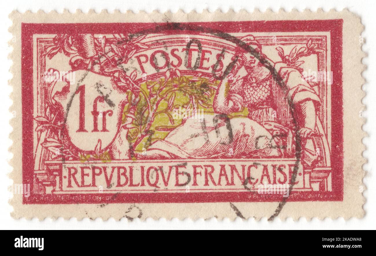 RANCE - 1900: An 1 franc claret and olive-green postage stamp depicting allegory Liberty and Peace. Standard issue "Merson", designed by Nicolas Luc-Olivier Merson Stock Photo