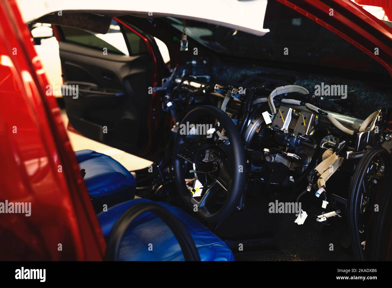 car interior repair. car in automobile repair service center with softfocus and over light in