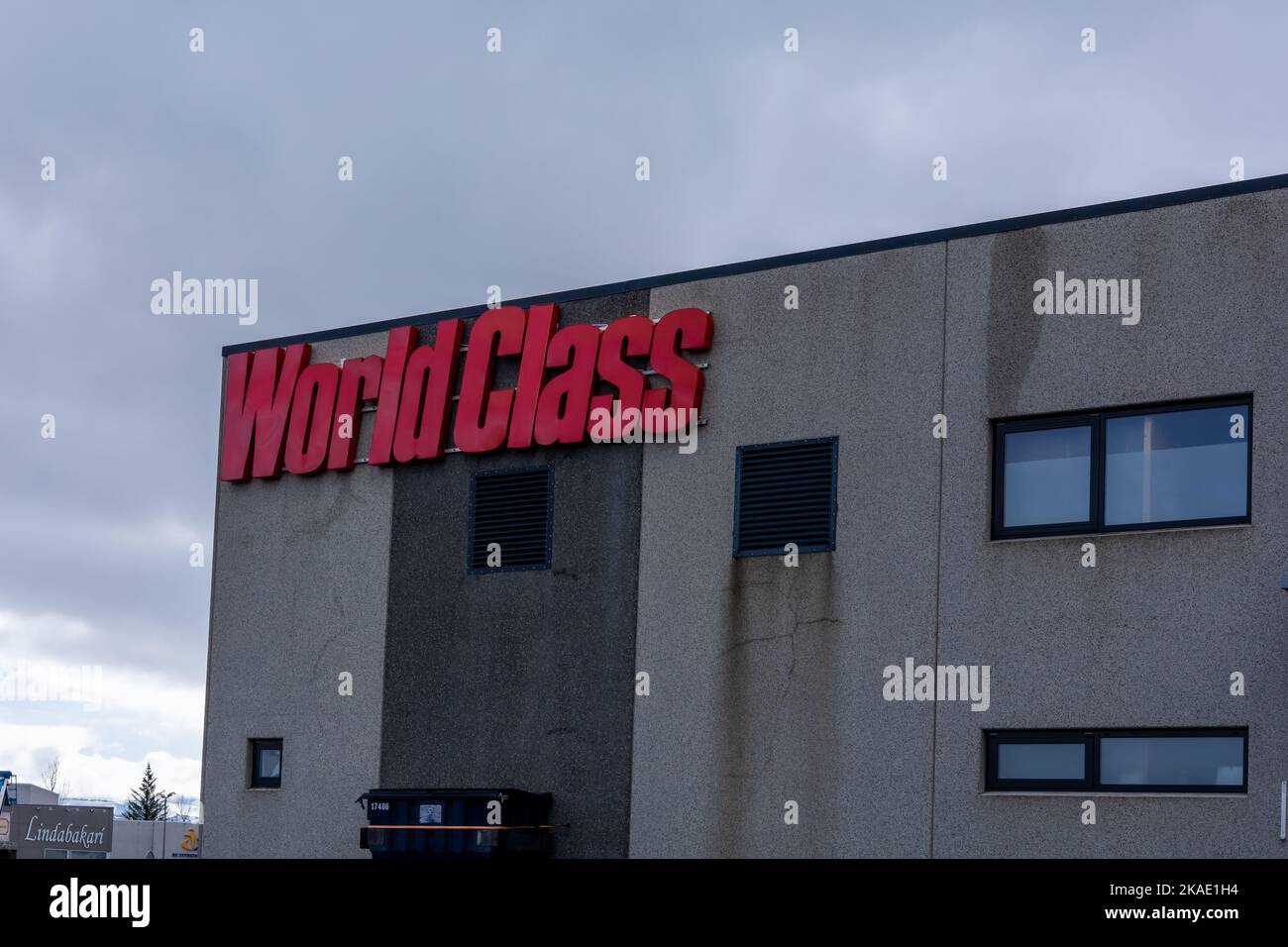 Reykjavik, Iceland - March 26, 2022: World Class fitness center. Red logo on a building. Stock Photo