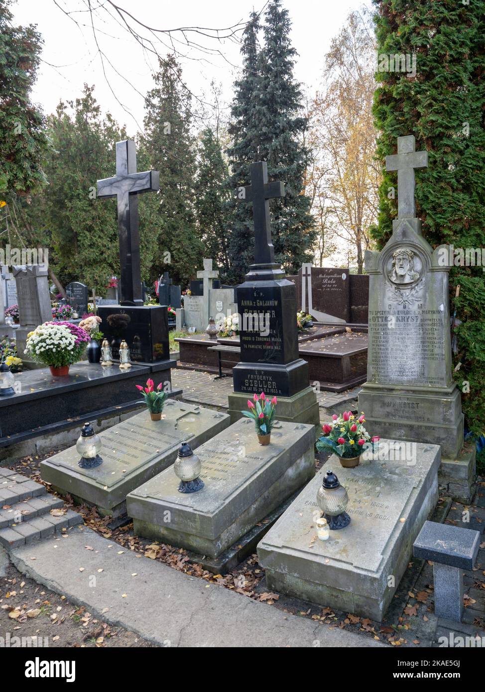 Poland, Raszyn 11 02 2022: All Saints Day in small cemetery. Stock Photo