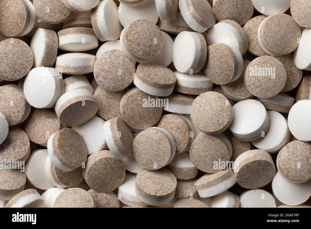 Dutch black and white liquorice pastilles close up full frame as background Stock Photo