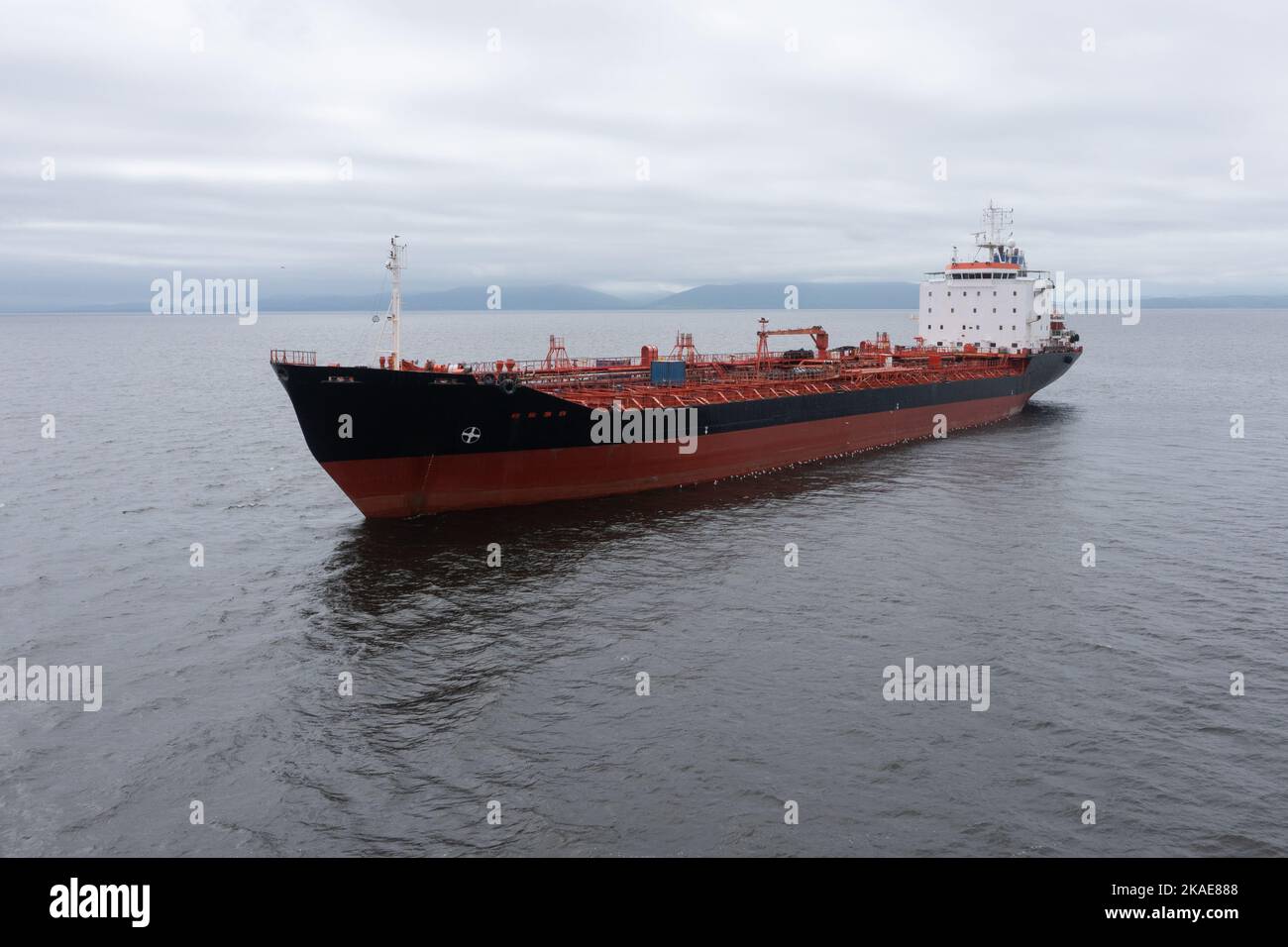 The sea tanker in the middle of a gulf. Stock Photo