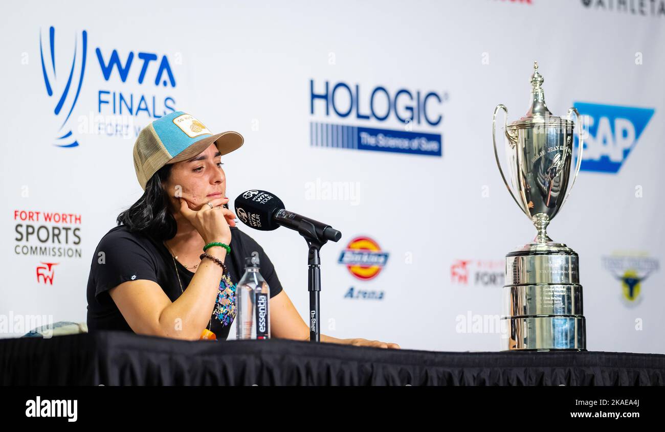 Ons Jabeur of Tunisia talk to the press during Media Day at the 2022