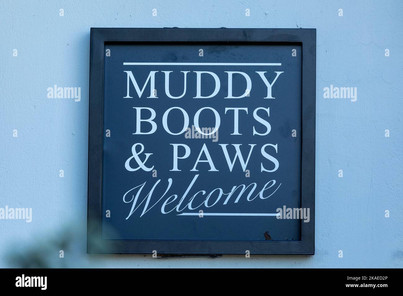 Sign inviting muddy boots and paws, Cuckmere Inn, Seven Sisters, South Downs, England, Great Britain Stock Photo