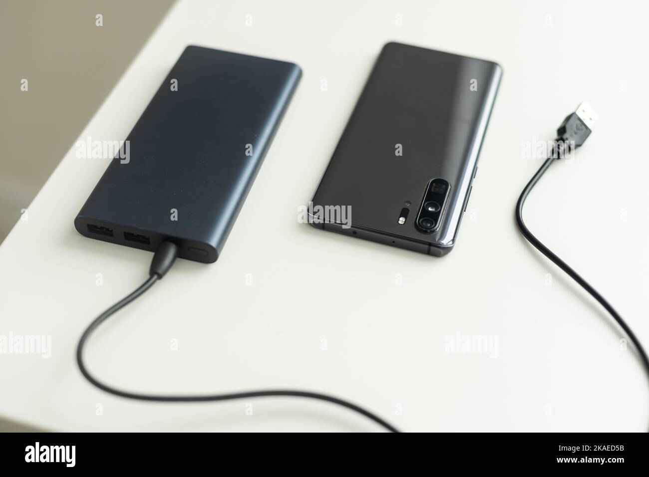 Power bank for charging mobile devices. Smartphone charger. External ...
