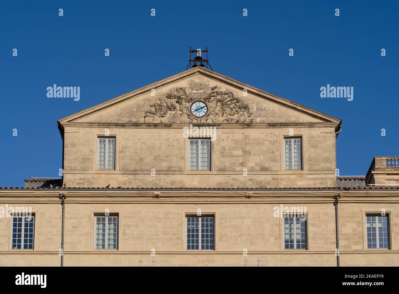 Detail view of the ancient stone facade of Hotel de Massilian, an historic building home of the Musee Fabre, a famous landmark of Montpellier, France Stock Photo