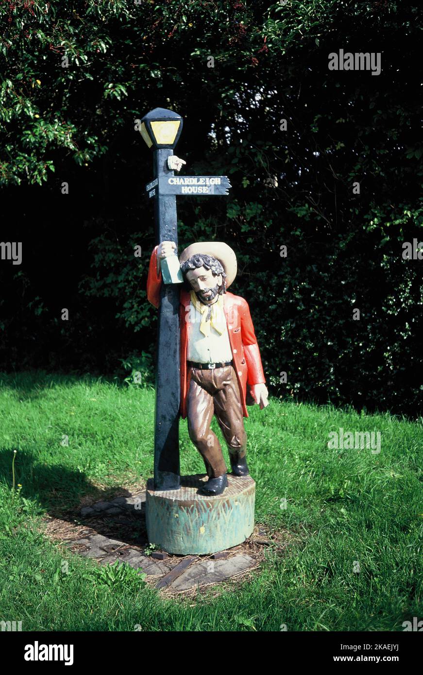 United Kingdom. England. Somerset. Chardleigh Green. Wadeford. Chard. 'The drunk' statue figure signpost to Chardleigh House. Stock Photo