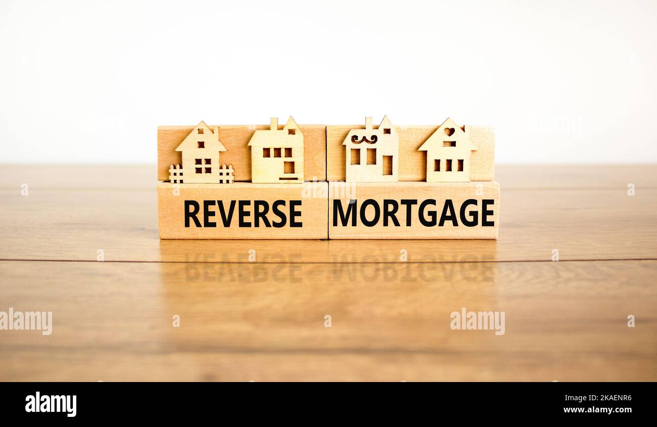 Reverse mortgage symbol. Concept words Reverse mortgage on wooden ...