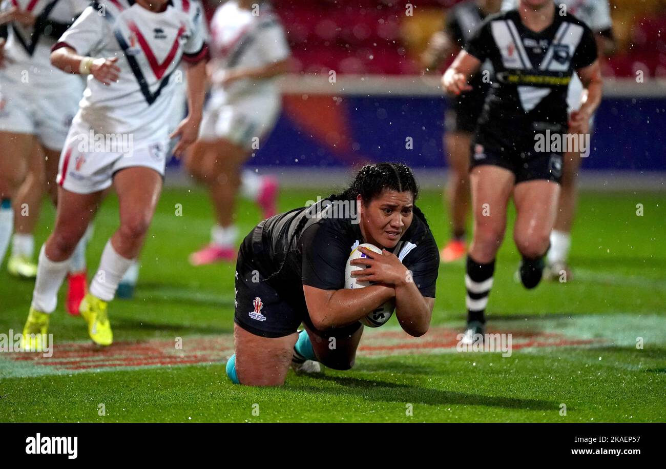 New Zealand's Amber Hall dives in to score her sides third try during ...