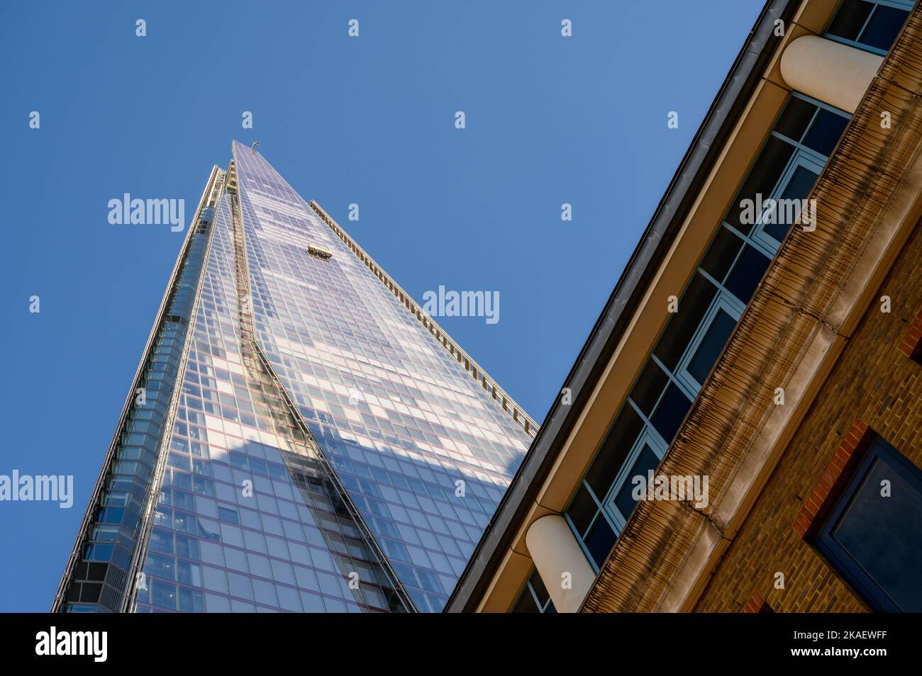 LONDON - November 4, 2020: View up The Shard with the corner of Guys Hospital in the foreground Stock Photo