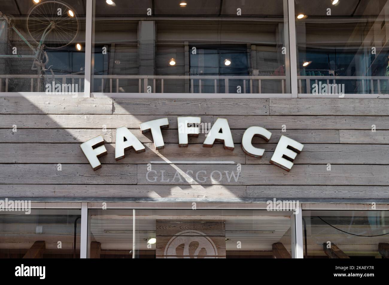 Glasgow, UK- Sept 10, 2022: The sign for Fatface clothing store in downtown Glasgow, Scotland Stock Photo
