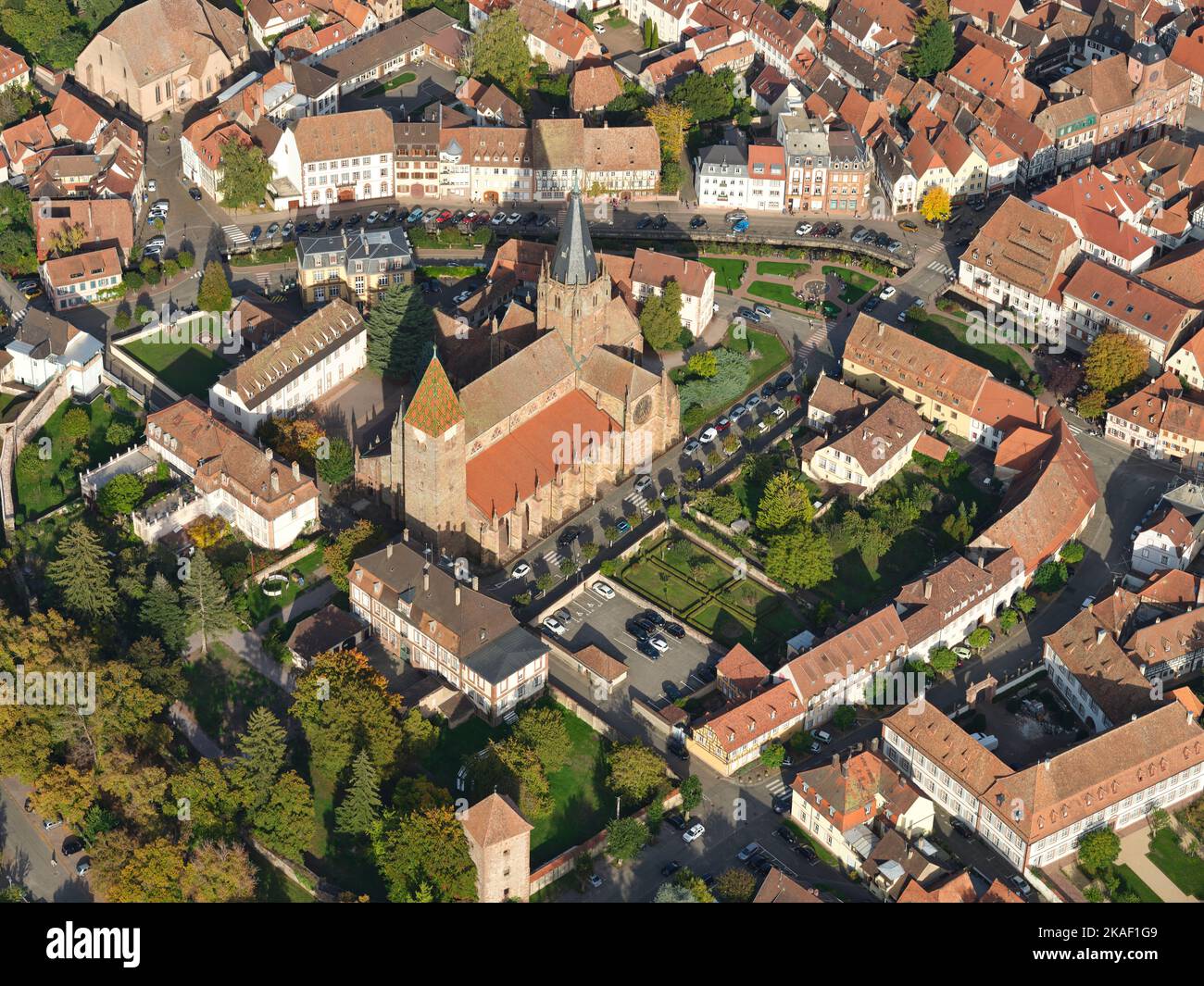 AERIAL VIEW. St. Peter and St. Paul's Church in the historic center of Wissembourg. Bas-Rhin, Alsace, Grand Est, France. Stock Photo