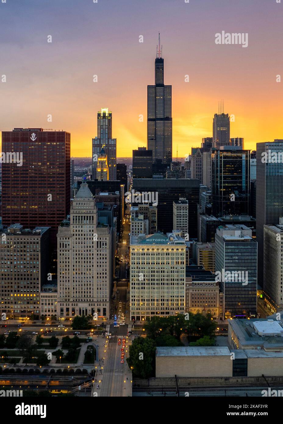An aerial view of Chicago Downtown with high skyscrapers at sunset in ...
