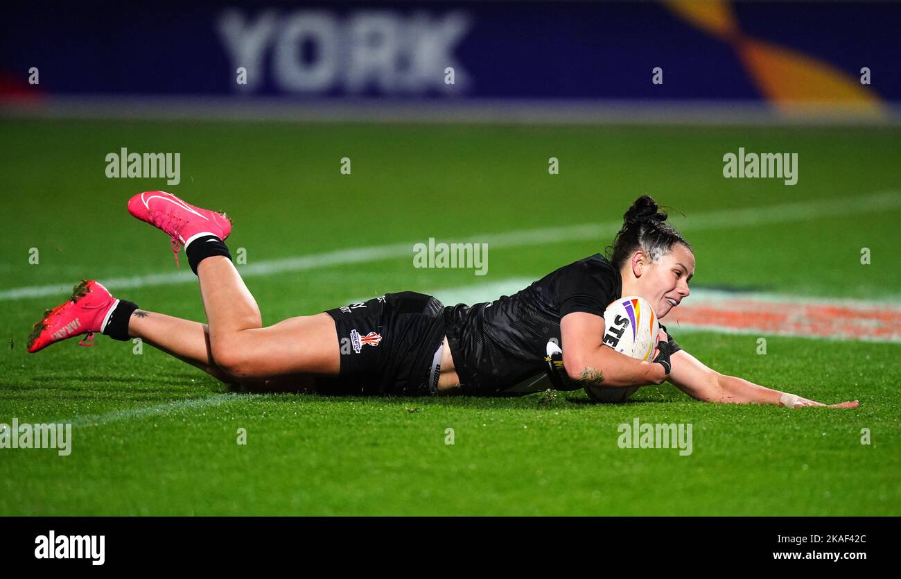 New Zealand's Shanice Parker dives in to score a try during the Women's