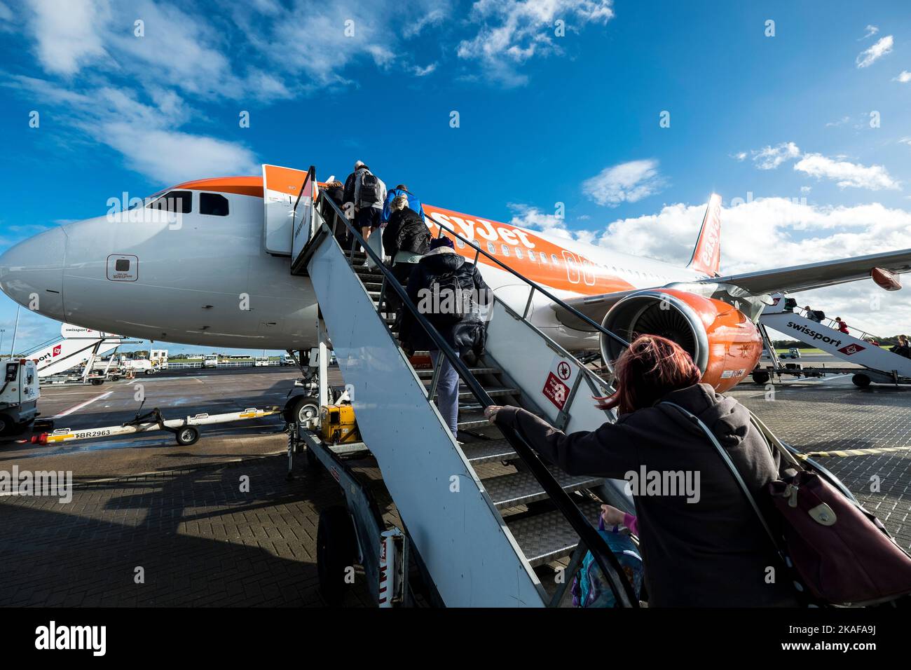 Passengers boarding an Easyjet flight at Belfast International Airport