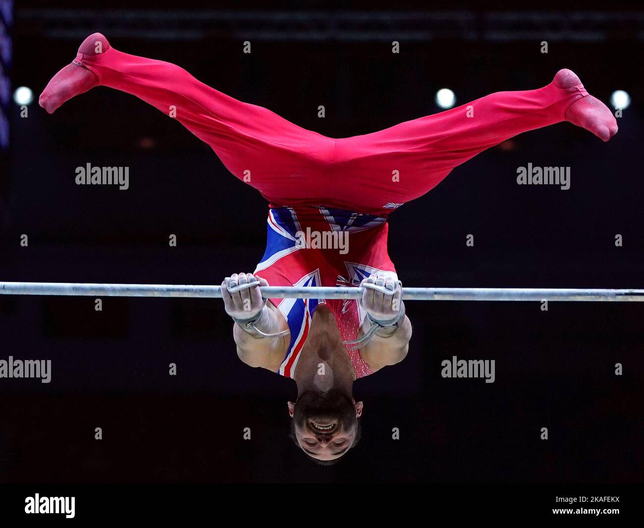 Great Britain's Jams Hall performing on the horizontal bar during day