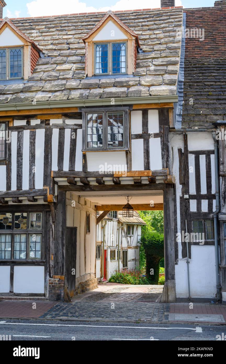 The front facade and gateway leading to the courtyard and garden of an
