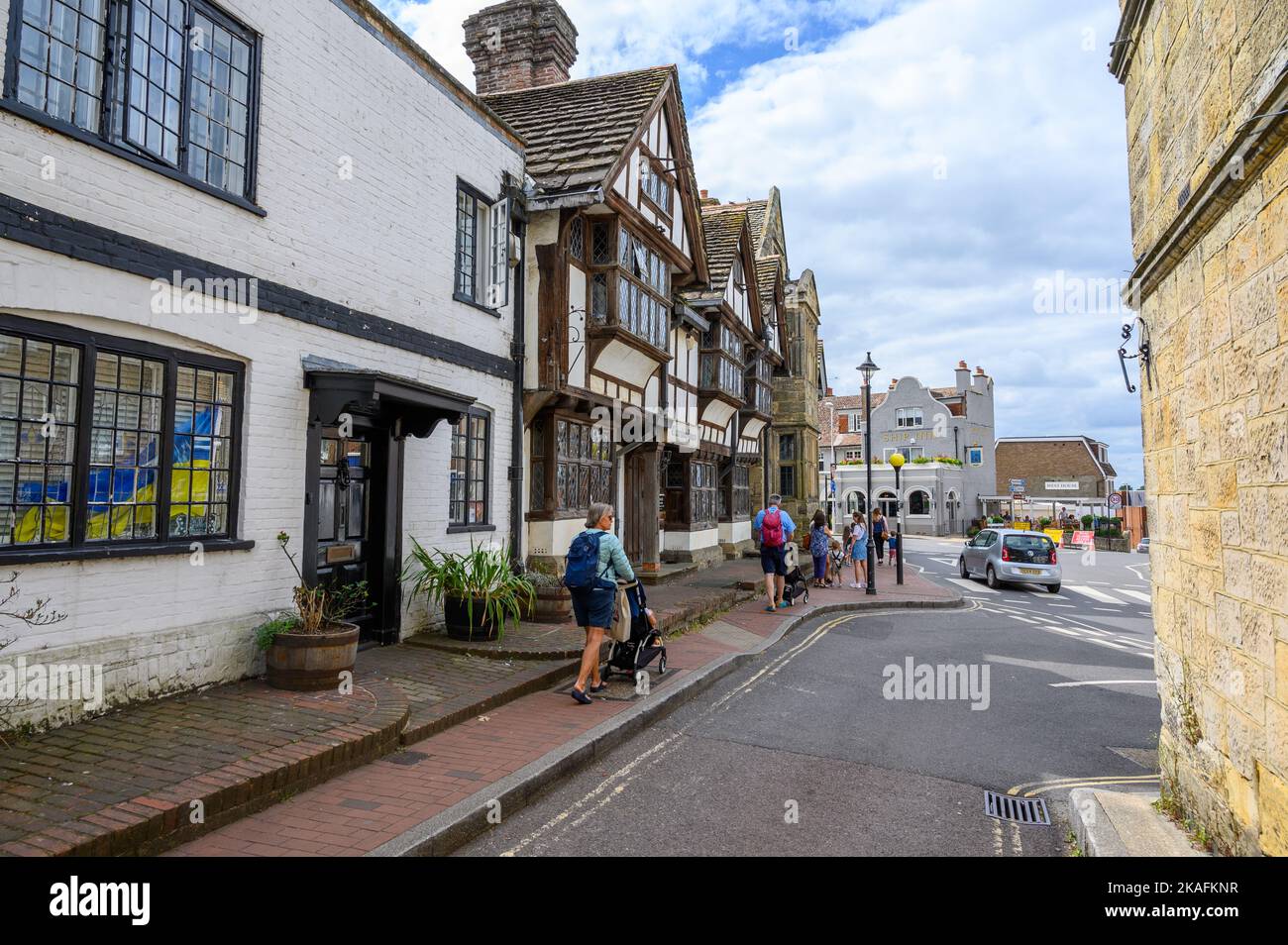 One end of the long row of old, historic houses along High Street in East Grinstead, East Sussex, England. Stock Photo