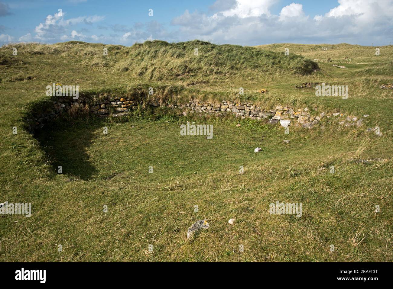 Cladh Hallan roundhouse on the island of South Uist, Outer Hebrides, Scotland, UK. Stock Photo