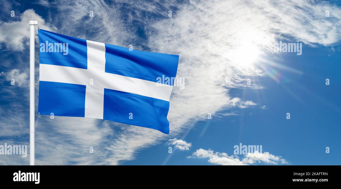 The flag of Shetland is a white or silver Nordic cross on a blue background. Stock Photo