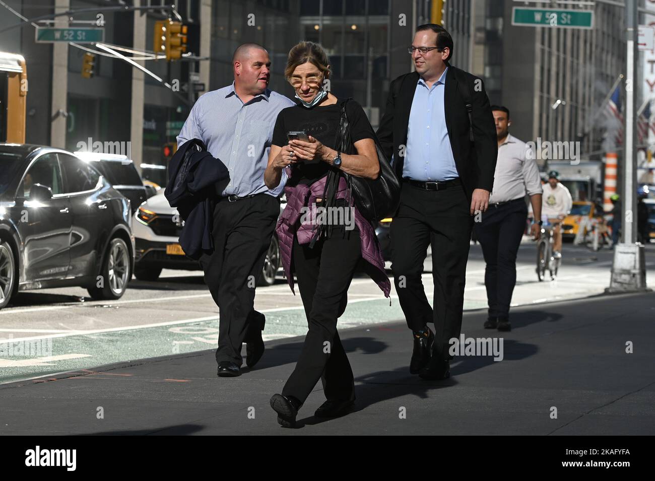 New York, USA. 02nd Nov, 2022. People walking along 6th Avenue wearing
