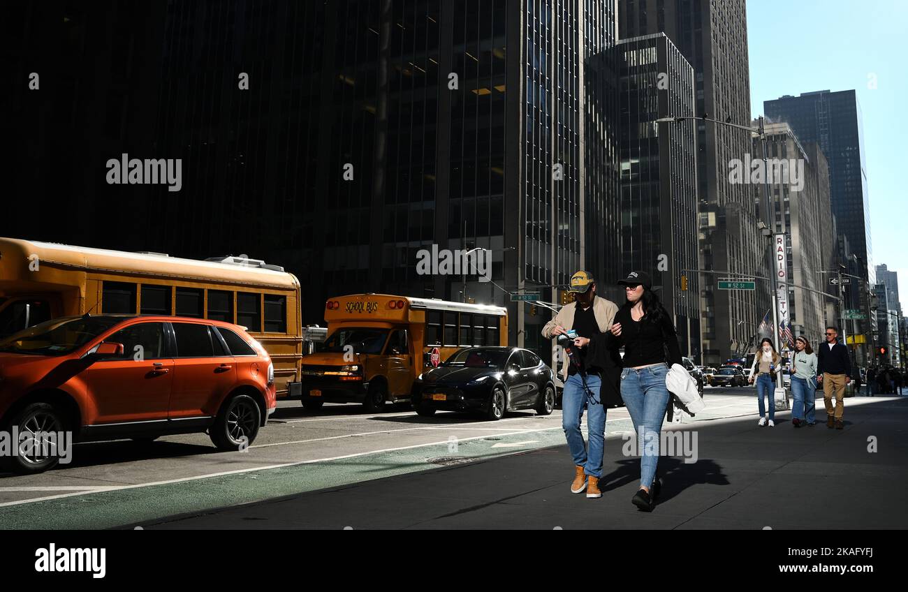 New York, USA. 02nd Nov, 2022. People walking along 6th Avenue wearing