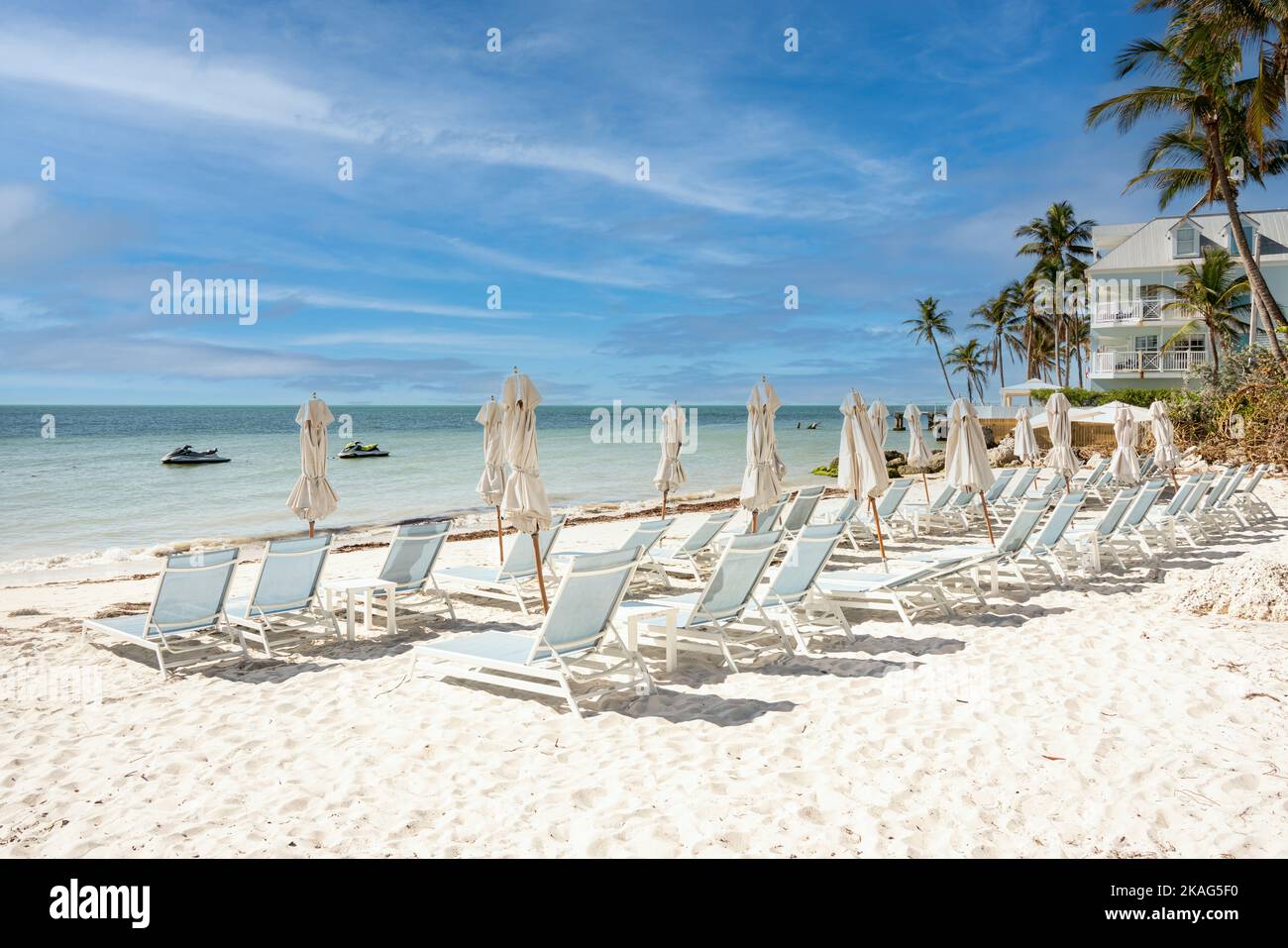 Key West beach Landscape with the empty beach chairs, yellow sand