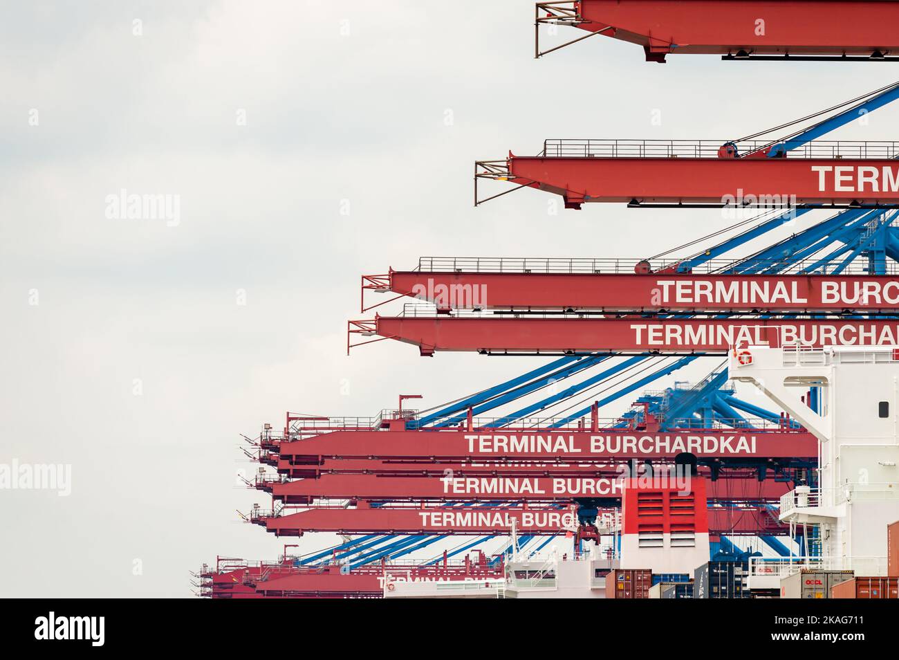 Hamburg. Germany - July 07, 2014: Closeup of cranes of Container Terminal Burchardkai in Hamburg Harbor at overcast day. Stock Photo