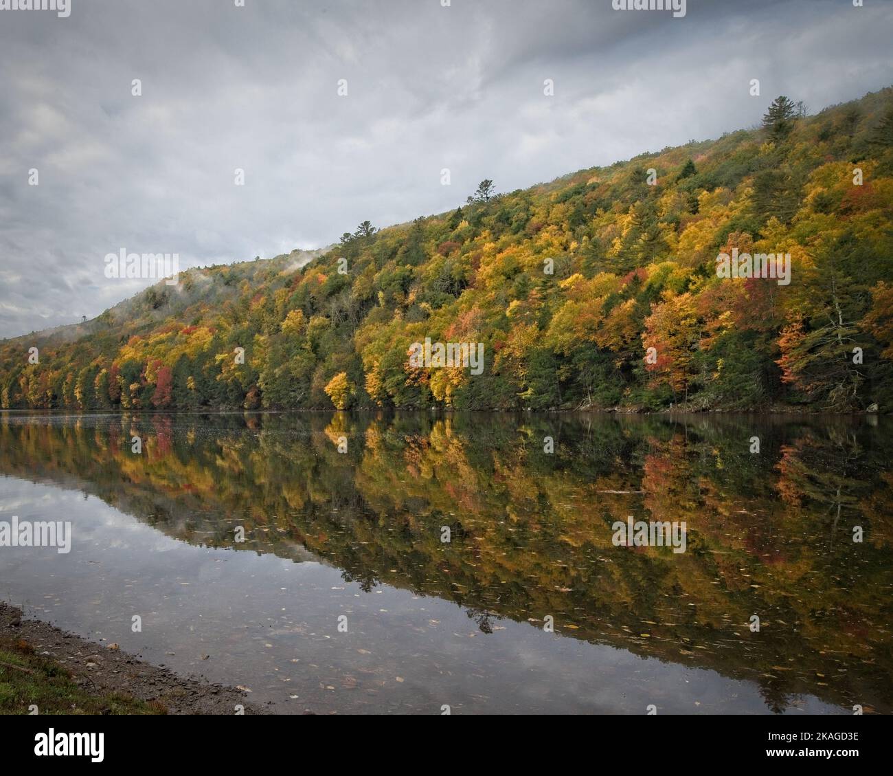 Cloudy autumn sky over the Mongaup River Stock Photo