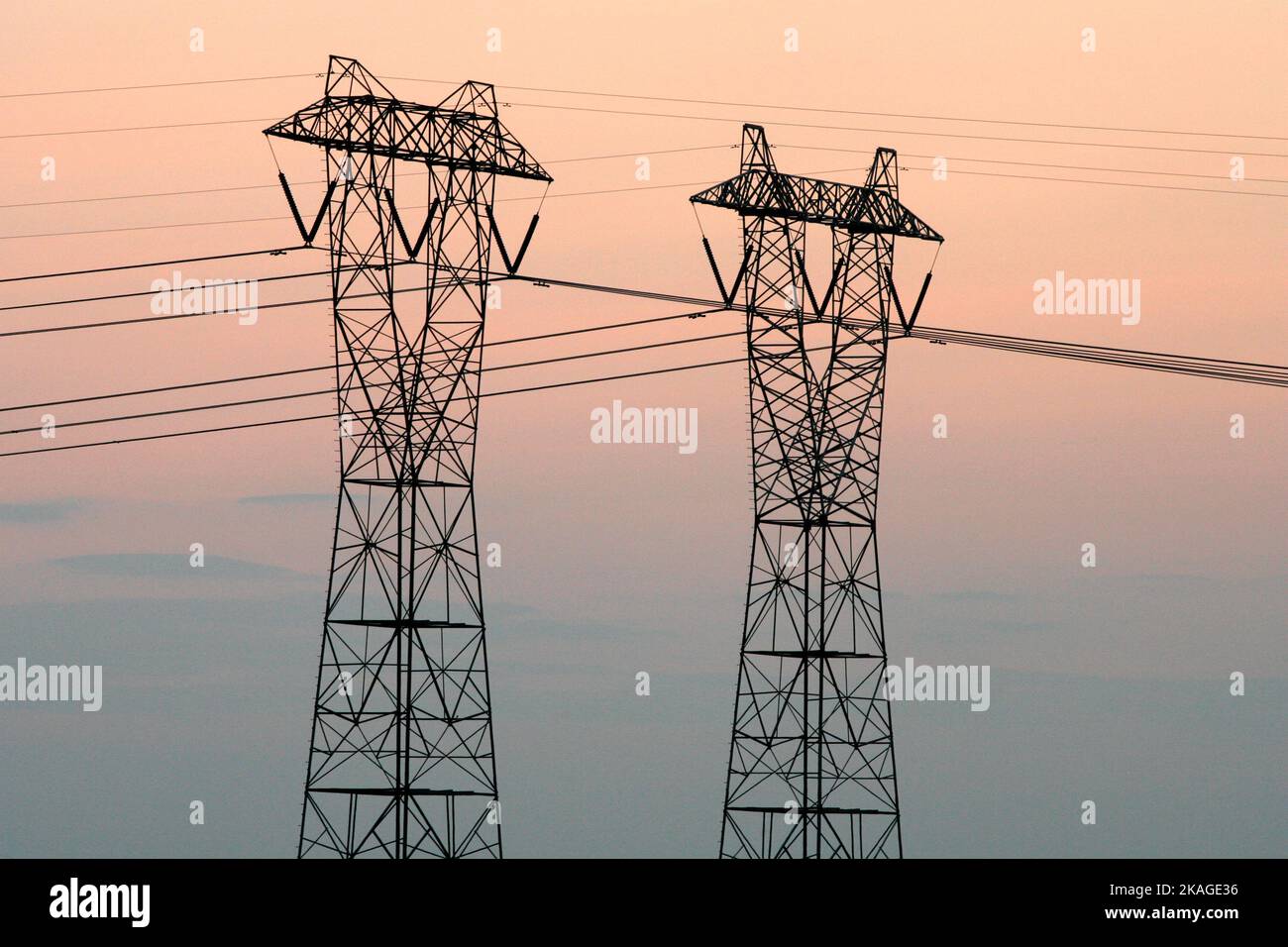 Sunset behind transmission lines in Salem County, NJ. Stock Photo