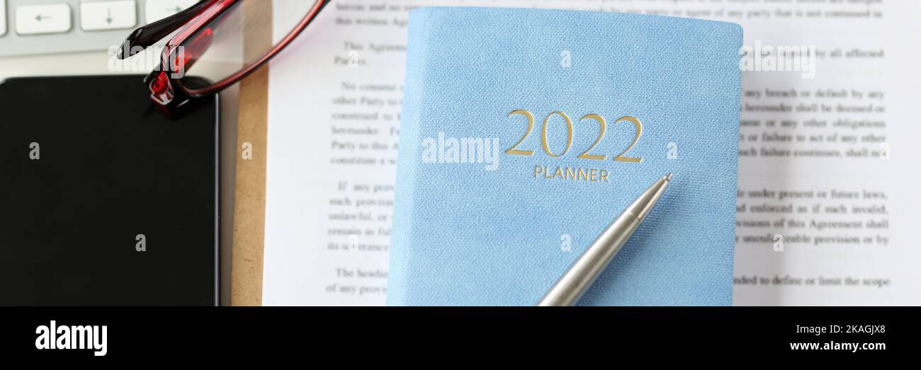 Lease agreement contract sheet, notebook planner for year, smartphone ...