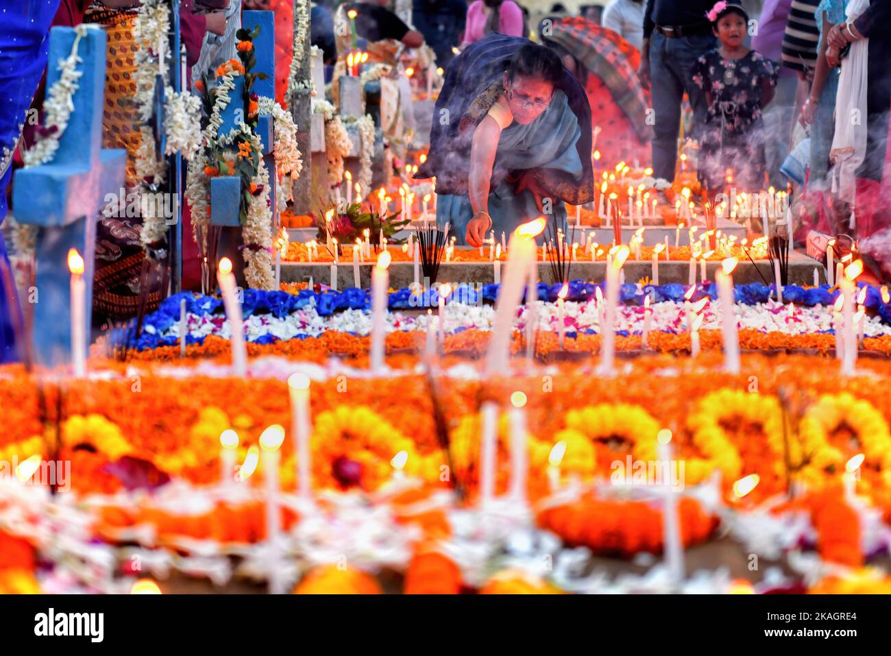 Woman beside grave relative who hires stock photography and images Alamy