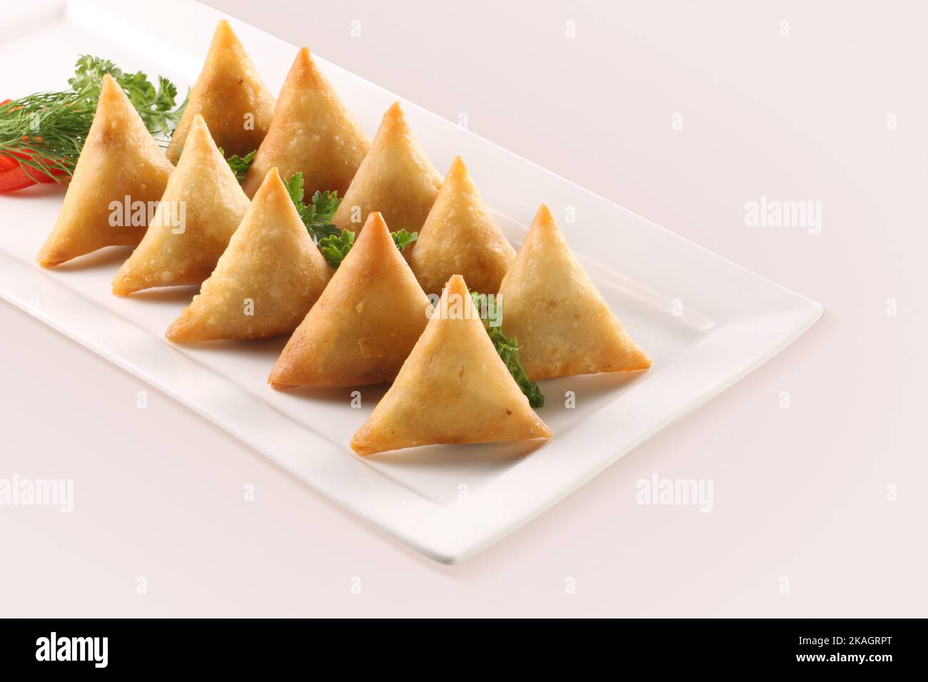 Isolated Potato Samosa Snacks on White Background. Indian Ramadan Food