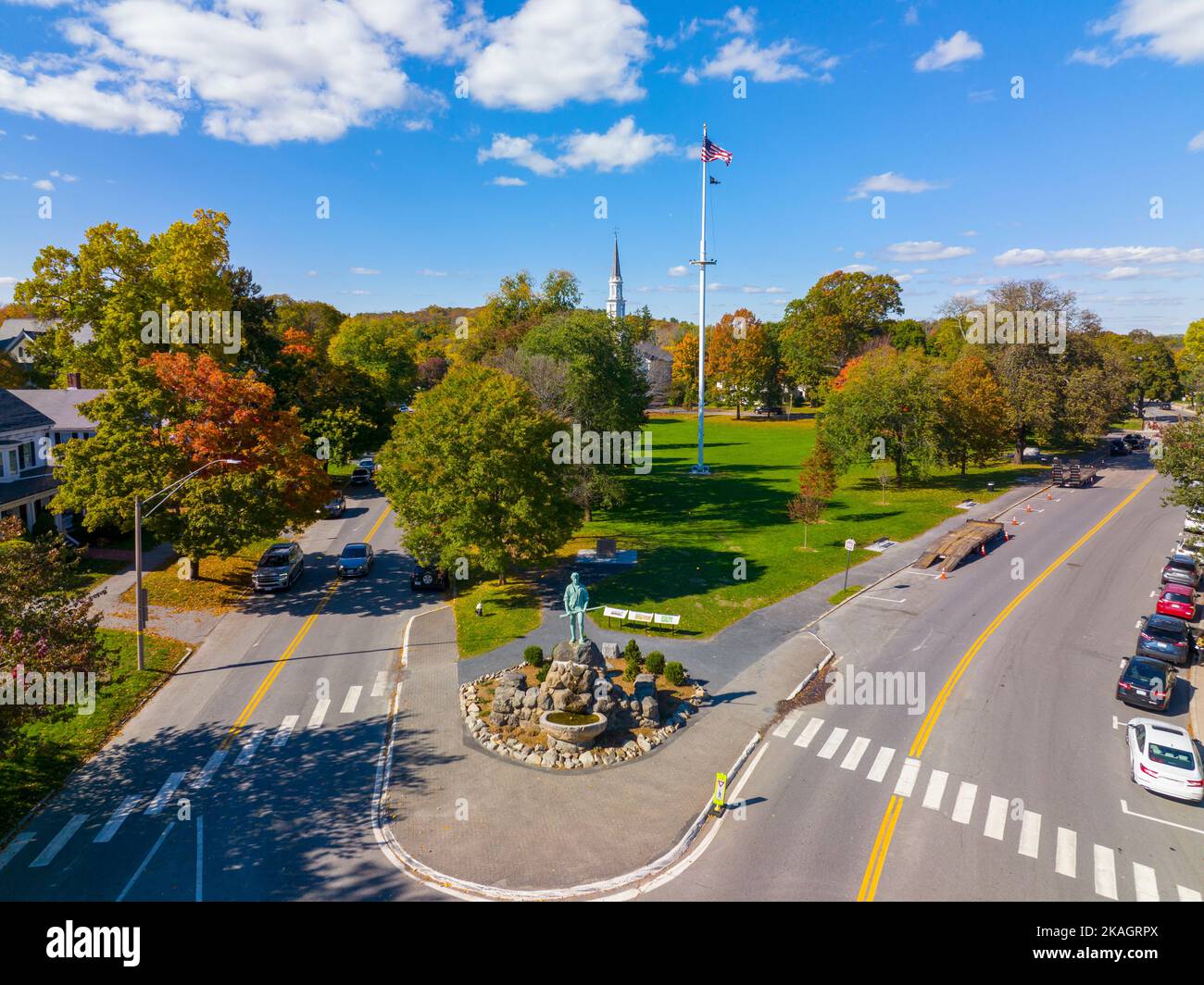 Lexington Minuteman Statue aerial view in fall on Lexington Common with First Parish Church, town of Lexington, Massachusetts MA, USA. Stock Photo